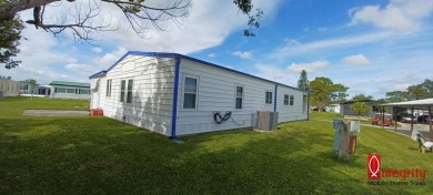 Come settle down and relax in a beautiful manufactured home with on Fairways Country Club in Florida - for sale on GolfHomes.com, golf home, golf lot