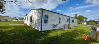 Come settle down and relax in a beautiful manufactured home with on Fairways Country Club in Florida - for sale on GolfHomes.com, golf home, golf lot