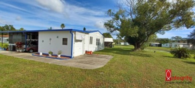 Come settle down and relax in a beautiful manufactured home with on Fairways Country Club in Florida - for sale on GolfHomes.com, golf home, golf lot