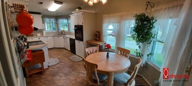 Come settle down and relax in a beautiful manufactured home with on Fairways Country Club in Florida - for sale on GolfHomes.com, golf home, golf lot