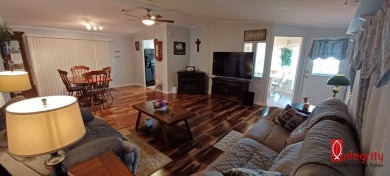 Come settle down and relax in a beautiful manufactured home with on Fairways Country Club in Florida - for sale on GolfHomes.com, golf home, golf lot