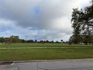 Beautiful, updated 2-bedroom, 1-bath home situated on nearly a on Clearwater Executive Golf Course in Florida - for sale on GolfHomes.com, golf home, golf lot