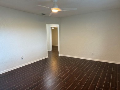 Beautiful, updated 2-bedroom, 1-bath home situated on nearly a on Clearwater Executive Golf Course in Florida - for sale on GolfHomes.com, golf home, golf lot