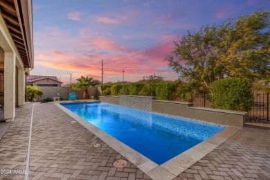 This Nearly NEW home features an amazing backyard with multiple on Tuscany Falls At Pebble Creek in Arizona - for sale on GolfHomes.com, golf home, golf lot