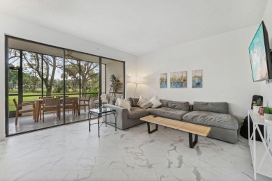 Welcome Home! Step into this light and bright first floor condo on Boca Pointe Country Club in Florida - for sale on GolfHomes.com, golf home, golf lot