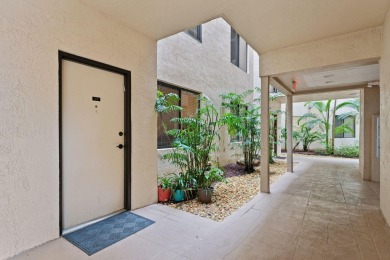 Welcome Home! Step into this light and bright first floor condo on Boca Pointe Country Club in Florida - for sale on GolfHomes.com, golf home, golf lot