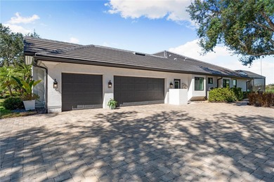Welcome to this exceptional custom Arthur Rutenberg residence on Laurel Oak Country Club in Florida - for sale on GolfHomes.com, golf home, golf lot
