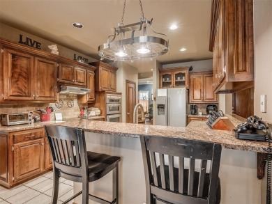 Discover the perfect blend of space, comfort, and location in on Coffee Creek Golf Course in Oklahoma - for sale on GolfHomes.com, golf home, golf lot