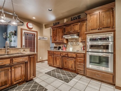 Discover the perfect blend of space, comfort, and location in on Coffee Creek Golf Course in Oklahoma - for sale on GolfHomes.com, golf home, golf lot