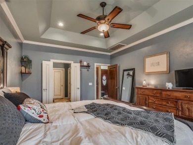 Discover the perfect blend of space, comfort, and location in on Coffee Creek Golf Course in Oklahoma - for sale on GolfHomes.com, golf home, golf lot