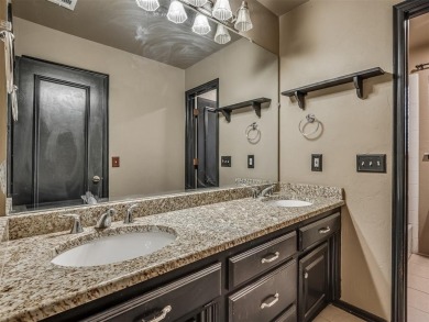 Discover the perfect blend of space, comfort, and location in on Coffee Creek Golf Course in Oklahoma - for sale on GolfHomes.com, golf home, golf lot
