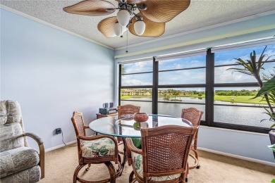 Great Winter retreat with beautiful water & golf view PLUS on Vista Plantation Golf Club in Florida - for sale on GolfHomes.com, golf home, golf lot