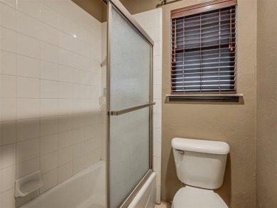 Discover the perfect blend of space, comfort, and location in on Coffee Creek Golf Course in Oklahoma - for sale on GolfHomes.com, golf home, golf lot