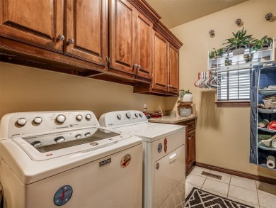 Discover the perfect blend of space, comfort, and location in on Coffee Creek Golf Course in Oklahoma - for sale on GolfHomes.com, golf home, golf lot