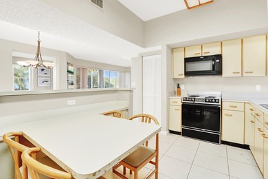 Sunlight pours into this beautifully positioned residence, where on Polo Club of Boca Raton in Florida - for sale on GolfHomes.com, golf home, golf lot