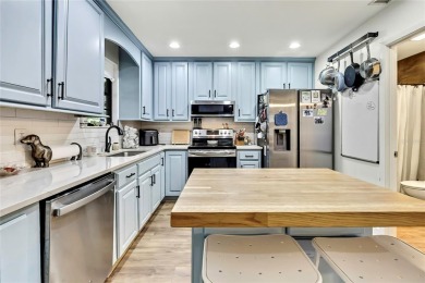 Tucked into the quiet charm of Forest Hills, 2227 S Village on Babe Zaharias Golf Course in Florida - for sale on GolfHomes.com, golf home, golf lot