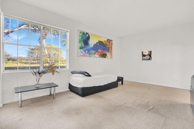 Sunlight pours into this beautifully positioned residence, where on Polo Club of Boca Raton in Florida - for sale on GolfHomes.com, golf home, golf lot