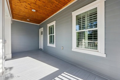 This stunning, custom built golf course home is the opportunity on The Palencia Club in Florida - for sale on GolfHomes.com, golf home, golf lot