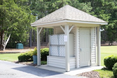 Stunning new lock and leave, low maintenance construction by on Pinewild Country Club of Pinehurst in North Carolina - for sale on GolfHomes.com, golf home, golf lot