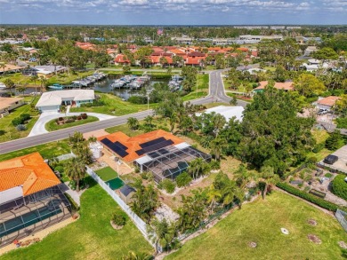 BRING YOUR BOAT! AND MOVE INTO THIS CHARMING COASTAL RETREAT in on Sorrento Par 3 in Florida - for sale on GolfHomes.com, golf home, golf lot