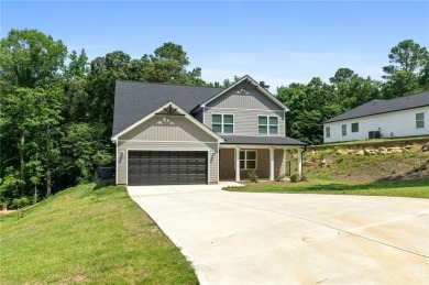 Discover this stunning 3-bedroom, 2.5-bath home with a spacious on Turtle Cove Golf Course in Georgia - for sale on GolfHomes.com, golf home, golf lot
