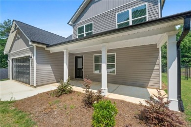 Discover this stunning 3-bedroom, 2.5-bath home with a spacious on Turtle Cove Golf Course in Georgia - for sale on GolfHomes.com, golf home, golf lot