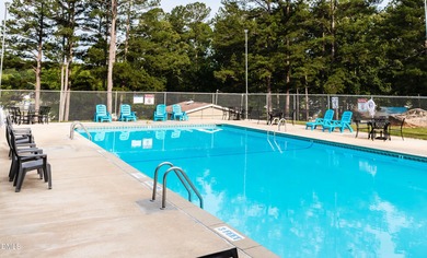 Beautiful 0.49-acre wooded lot located in the gated Lake Royale on River Golf and Country Club at Lake Royale in North Carolina - for sale on GolfHomes.com, golf home, golf lot