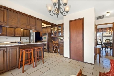 This stunning one-level contemporary home offers 2,173 square on The Greens Country Club in Oklahoma - for sale on GolfHomes.com, golf home, golf lot