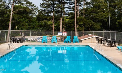 Beautiful 0.49-acre wooded lot located in the gated Lake Royale on River Golf and Country Club at Lake Royale in North Carolina - for sale on GolfHomes.com, golf home, golf lot