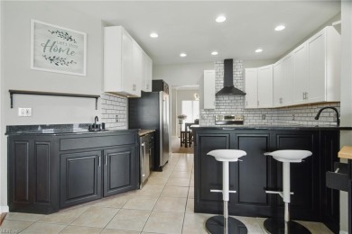 Welcome to this exquisite, custom-built, brick ranch located in on The Woodlands Golf Course in Virginia - for sale on GolfHomes.com, golf home, golf lot
