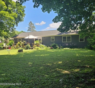 This spacious 4-bedroom, 2-bath ranch home is nestled in a quiet on Columbia Golf and Country Club in New York - for sale on GolfHomes.com, golf home, golf lot