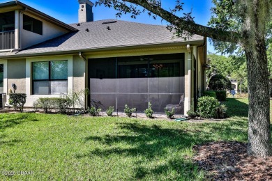 Rarely available one story end unit w/lake and fountain view in on Plantation Bay Golf and Country Club in Florida - for sale on GolfHomes.com, golf home, golf lot