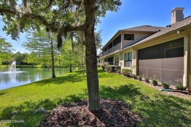 Rarely available one story end unit w/lake and fountain view in on Plantation Bay Golf and Country Club in Florida - for sale on GolfHomes.com, golf home, golf lot