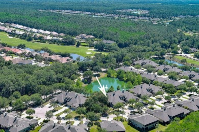 Rarely available one story end unit w/lake and fountain view in on Plantation Bay Golf and Country Club in Florida - for sale on GolfHomes.com, golf home, golf lot