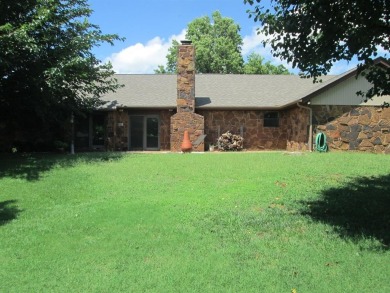 This stunning one-level contemporary home offers 2,173 square on The Greens Country Club in Oklahoma - for sale on GolfHomes.com, golf home, golf lot