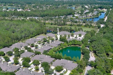 Rarely available one story end unit w/lake and fountain view in on Plantation Bay Golf and Country Club in Florida - for sale on GolfHomes.com, golf home, golf lot