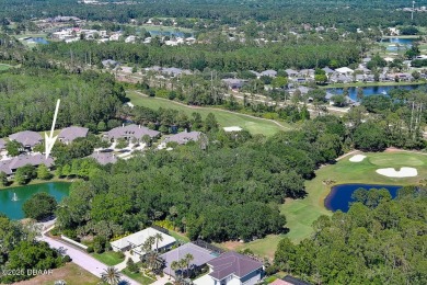 Rarely available one story end unit w/lake and fountain view in on Plantation Bay Golf and Country Club in Florida - for sale on GolfHomes.com, golf home, golf lot