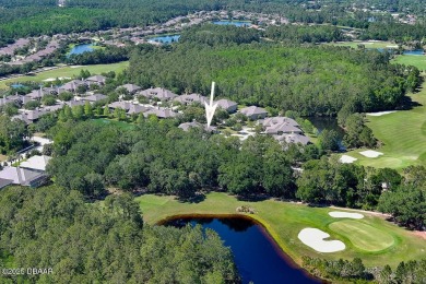 Rarely available one story end unit w/lake and fountain view in on Plantation Bay Golf and Country Club in Florida - for sale on GolfHomes.com, golf home, golf lot