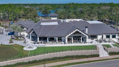 Rarely available one story end unit w/lake and fountain view in on Plantation Bay Golf and Country Club in Florida - for sale on GolfHomes.com, golf home, golf lot