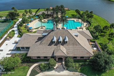 Rarely available one story end unit w/lake and fountain view in on Plantation Bay Golf and Country Club in Florida - for sale on GolfHomes.com, golf home, golf lot