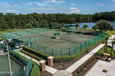 Rarely available one story end unit w/lake and fountain view in on Plantation Bay Golf and Country Club in Florida - for sale on GolfHomes.com, golf home, golf lot