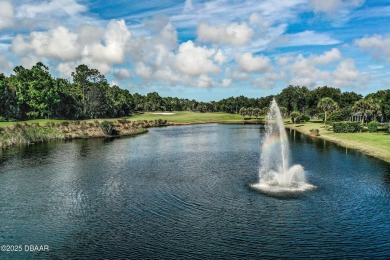 Rarely available one story end unit w/lake and fountain view in on Plantation Bay Golf and Country Club in Florida - for sale on GolfHomes.com, golf home, golf lot