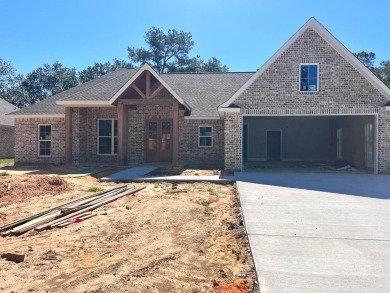 Looking for a custom built home tucked away on a quiet street on Millbrook Country Club in Mississippi - for sale on GolfHomes.com, golf home, golf lot