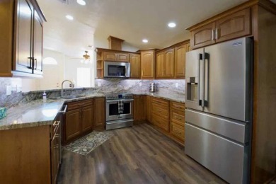 #252 Step into resort-style living in this beautifully updated on Mountain Brook Golf Club in Arizona - for sale on GolfHomes.com, golf home, golf lot