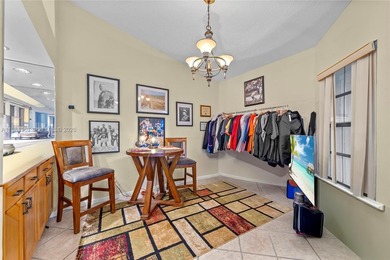 This beautiful 2-bedroom, 2-bathroom townhome features vaulted on Woodmont Country Club in Florida - for sale on GolfHomes.com, golf home, golf lot