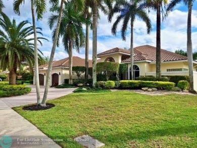 Allow yourself to be immersed in complete serenity and peace on Weston Hills Country Club in Florida - for sale on GolfHomes.com, golf home, golf lot