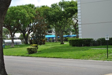 2 BEDROOM 2 BATH WHITEHALL II  CONDO LOCATED IN THE PRIVATE on Pine Island Ridge Country Club in Florida - for sale on GolfHomes.com, golf home, golf lot