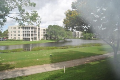 2 BEDROOM 2 BATH WHITEHALL II  CONDO LOCATED IN THE PRIVATE on Pine Island Ridge Country Club in Florida - for sale on GolfHomes.com, golf home, golf lot