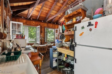 The address is 105 Hartzell Rd. It used to be Cottage #51 on Sebring Country Club in Ohio - for sale on GolfHomes.com, golf home, golf lot