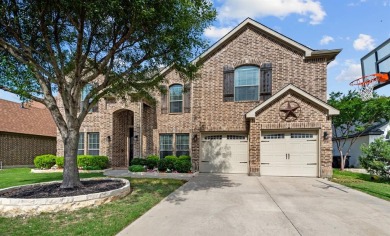 Look No Further! Enjoy this beautiful 5-bedroom home, featuring on Eagle Mountain Country Club  in Texas - for sale on GolfHomes.com, golf home, golf lot